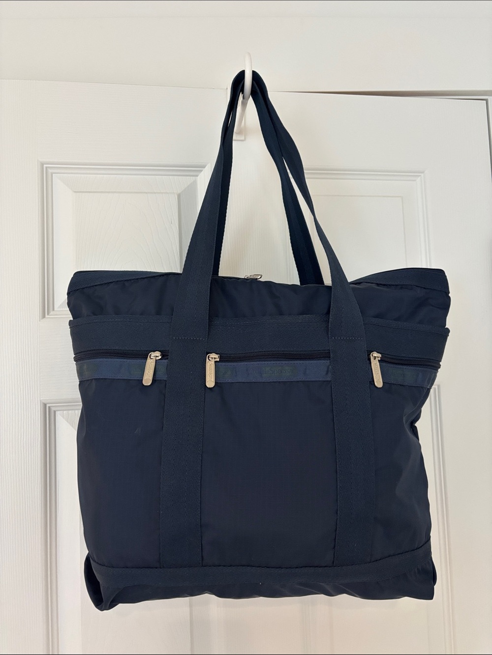 Lesportsac Nylon Tote Front Zipper Pockets lined interior zip pocket navy blue